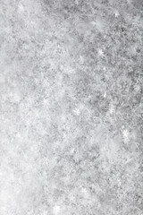White snowflakes in winter as a background.