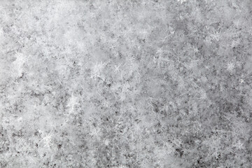Fototapeta na wymiar White snowflakes in winter as a background.