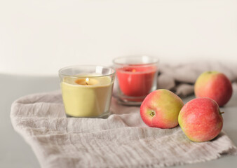 scented aromatherapy wax candles with apple aroma. fragrances for home, relaxation and inner peace concept.