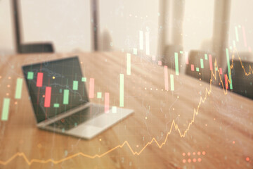 Abstract creative financial graph with world map on modern computer background, financial and trading concept. Multiexposure