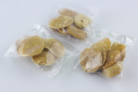 closeup indonesian food named Combro in packagaing isolated at white background