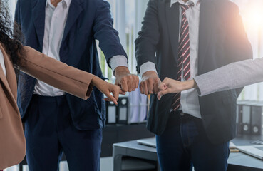 Business team standing hands together, Volunteer charity work. People join for cooperation success...