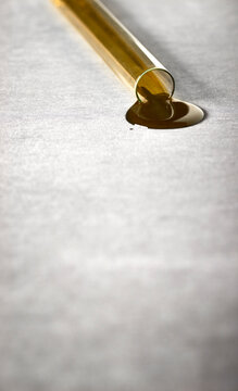 Oil pool on a white paper from a test tube 