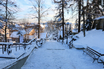 NOWY TARG, POLAND - JANUARY 18, 2021: A stairs covered with snow in Nowy Targ, Poland.