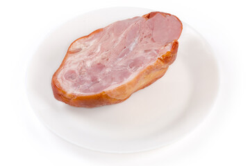 Half of boiled-smoked pork knuckle on a white plate