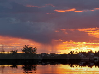 storm, moments before it discharges the gale and the deluge