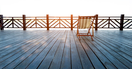Deck chair on deck by the sea