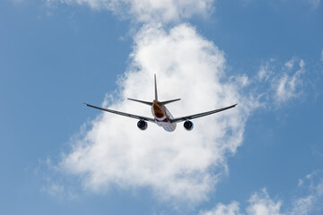 G-DHLY 777-F Climbing after takeoff from EMA with editorial space - stock photo.jpg