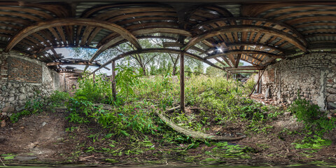 360 hdr panorama inside abandoned ruined bushy wooden decaying hangar or old building in full...