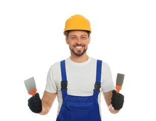 Professional worker with putty knives in hard hat on white background