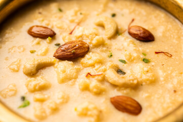 Nolen Gurer Chanar Payesh or Milk pudding of cottage cheese, rice and jaggery, bengali sweet recipe
