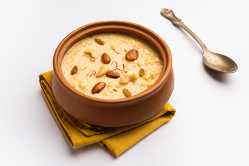 Nolen Gurer Chanar Payesh or Milk pudding of cottage cheese, rice and jaggery, bengali sweet recipe