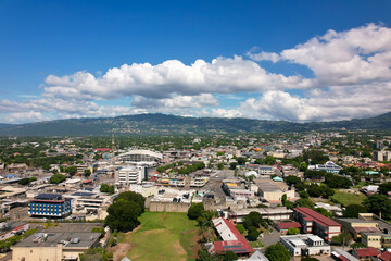 Aerial view of Kingston city, Jamaica. City landscape, roads, buildings, mountains