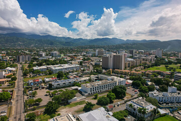 Aerial view of Kingston city, Jamaica. City landscape, roads, buildings, mountains