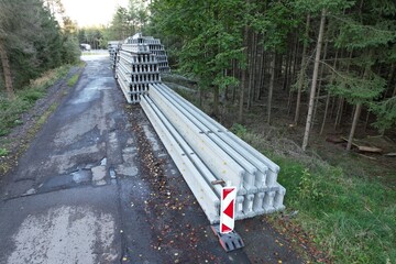 piles of Roadside barriers are used to protect traffic from roadside obstacles or hazards, such as...