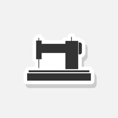 Sewing machine glyph sticker icon isolated on white background