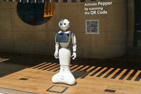 Closeup Shot Of The White Pepper Robot Inside A Bank To Assist Customers With Financial Services