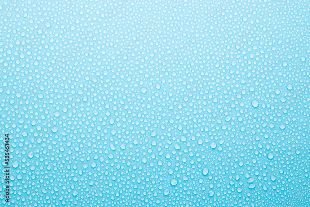 Poster water drops on soft light blue background as elegant fresh pattern with tiny shiny round drops, top 