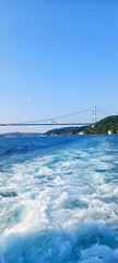 Vertical shot of the Bosphorus bridge above the Bosphorus Strait, Istanbul, Turkey