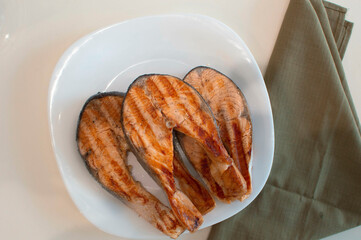 Delicious fried salmon. Grilled salmon steak, horizontal