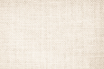 Jute hessian sackcloth burlap woven, linen texture pattern background in light beige cream brown color  canvas fiber line cotton cloth textured.