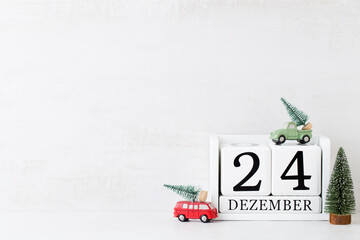 Christmas backgrounds. Christmas calendar, 24 december on the gray background. - obrazy, fototapety, plakaty