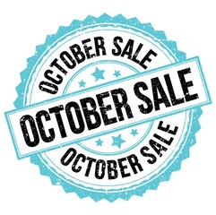 OCTOBER SALE text on blue-black round stamp sign