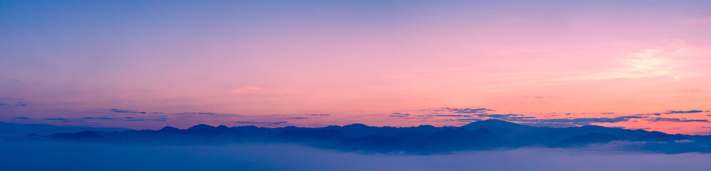Fototapeta na wymiar Sunset sky with fog