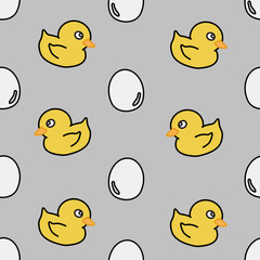 baby duck and egg in background