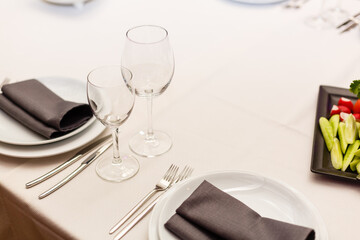 Served dinner table in a restaurant. Restaurant interior