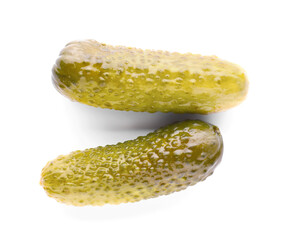 Tasty crunchy pickled cucumbers on white background, top view