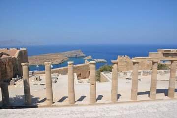 Lindos acropolis on greek island rhodes with blue sea on background