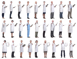 Obraz premium full length group of doctors with notepad isolated