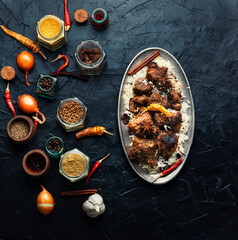 Vindaloo, meat in fried spices.