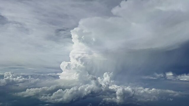 Dramatic Aerial View Recorded From A Jet Cockpit Of A Huge  And Very Actice Cumulonimbus Impossible To Overfly. Pilot Point Of View. 4K 60 Fps.