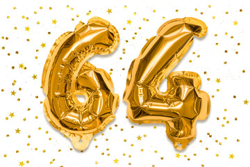 The number of the balloon made of golden foil, the number sixty four on a white background with sequins. Birthday greeting card with inscription 64. Numerical digit, Celebration event.
