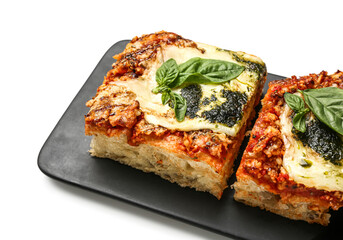 Board with tasty Italian pie with mozzarella and pesto sauce on white background, closeup