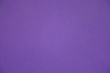 Fototapeta premium Surface of bright violet painted wall (frot view)