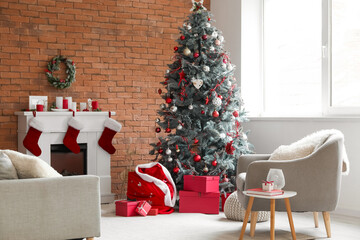 Interior of living room with Santa bag, fireplace and Christmas tree