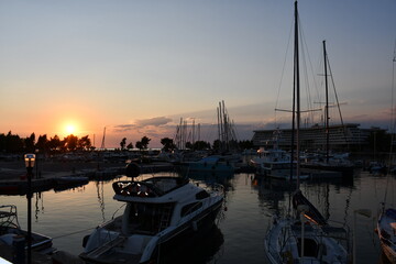 Sunset  photo of yacht port on sea