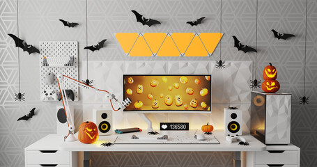 A general view of a gamer's home workplace with a computer and a gamepad decorated with decorations for the Halloween holiday.