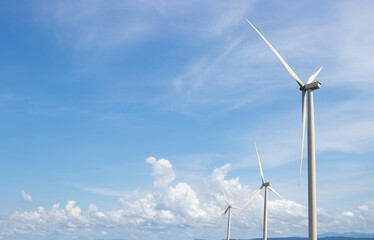 Wind turbine generate electricity with blue sky.