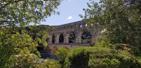 Papier Peint photo autocollant Pont du Gard Pont du Gard, an ancient Roman aqueduct bridge in Vers-Pont-du-Gard, France.