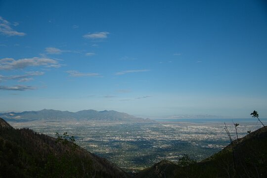 High-angle Shot Of Salt Lake City From The Mountains With Blue Skyline Background