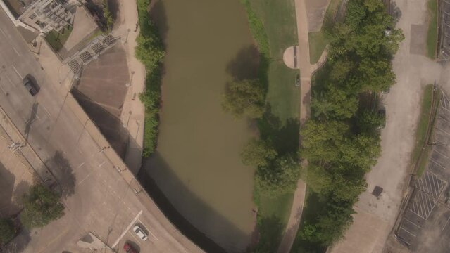 Drone view of a river and traffic road with cars