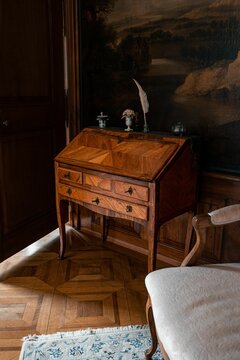 Vertical shot of an old cupboard with beautiful decoration on it in Zofingen, Switzerland
