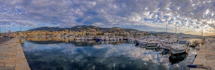 Fototapeta na wymiar Panorama over the harbour of the Italian city of San Remo