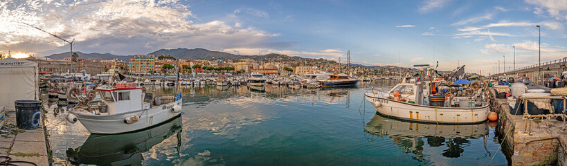 Fototapeta na wymiar Panorama over the harbour of the Italian city of San Remo