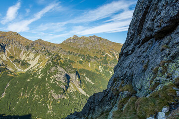 A view of the ridge in the Tatra Mountains on a clear day, just after sunrise. - 535495435