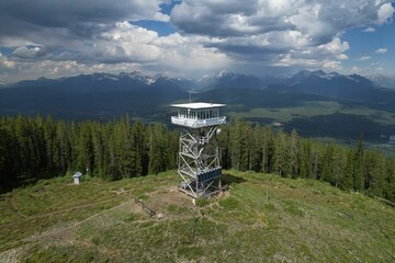 Aerial shot of Montana Fire Lookout tower with Glacier National Park wilderness behind